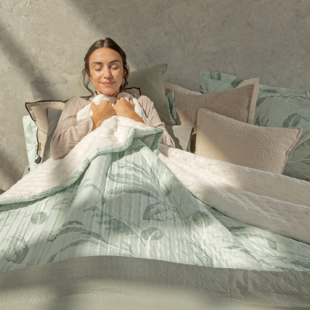 Cubrecama Quilt Estampado Sherpa Banano 1.5 Plazas Turquesa