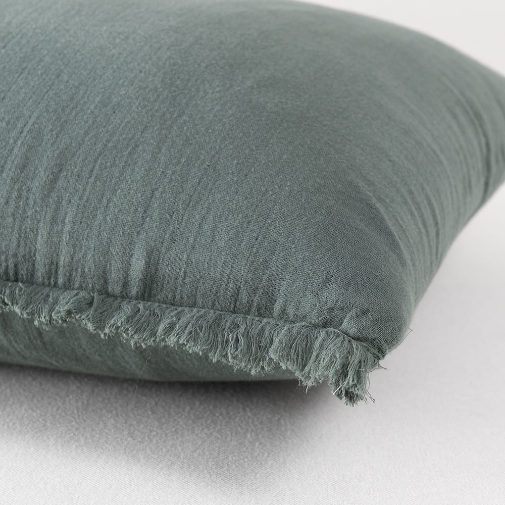 Cojín Muslin Flecos Petróleo